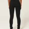 Hoch geschnittene schwarze Jeans-Leggings Hoch geschnittene schwarze Jeans-Leggings