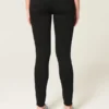 Hoch geschnittene schwarze Jeans-Leggings Hoch geschnittene schwarze Jeans-Leggings