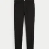 Hoch geschnittene schwarze Jeans-Leggings Hoch geschnittene schwarze Jeans-Leggings