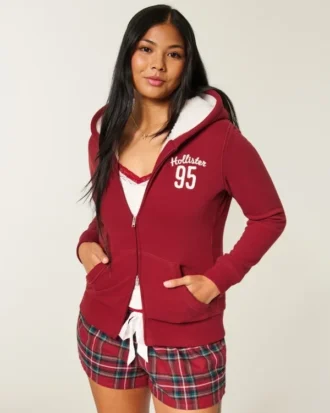 Holiday Vault Release Sherpa-gefütterter Hoodie mit Reißverschluss und Logo-Grafik