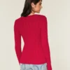 Ikonischer Pullover mit V-Ausschnitt und Zopfmuster