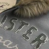 Kapuzenjacke mit Kunstfellbesatz, Reißverschluss und Logo-Grafik