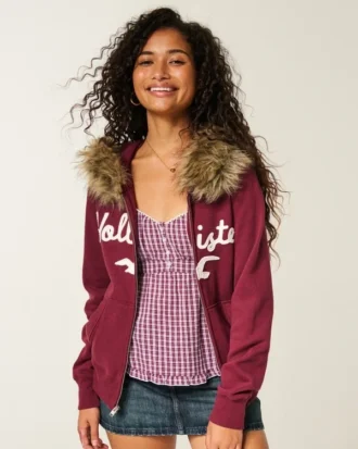 Kapuzenjacke mit Kunstfellbesatz und Logo-Grafik