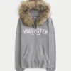 Kapuzenjacke mit Kunstfellbesatz und Logo-Grafik Kapuzenjacke mit Kunstfellbesatz und Logo-Grafik