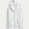 Kapuzenjacke mit Waffelfutter und Reißverschluss Logo-Grafik-Kapuzenjacke Kapuzenjacke mit Waffelfutter und Reißverschluss Logo-Grafik-Kapuzenjacke