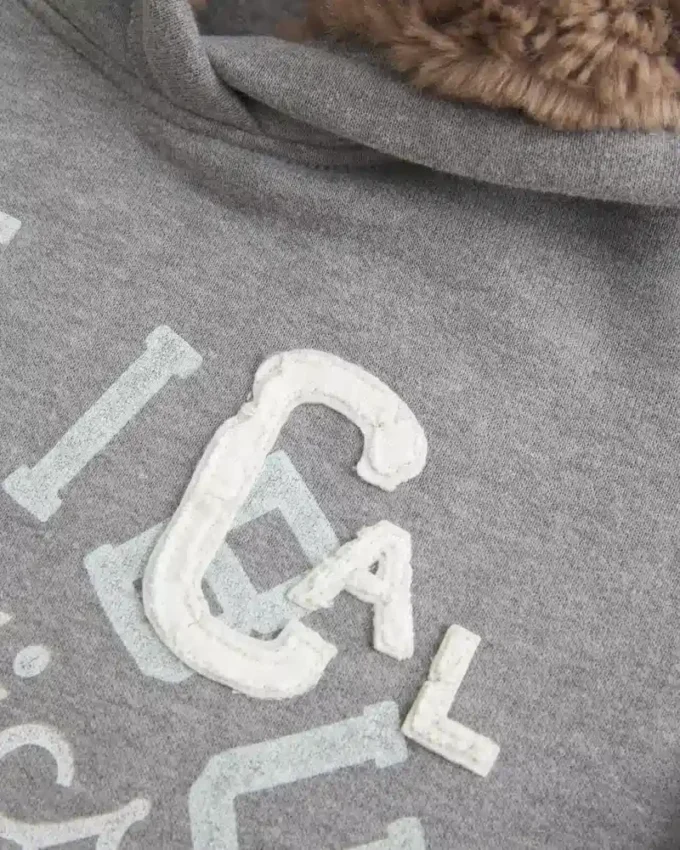 Kapuzenpullover mit Kunstfellfutter und Grafik