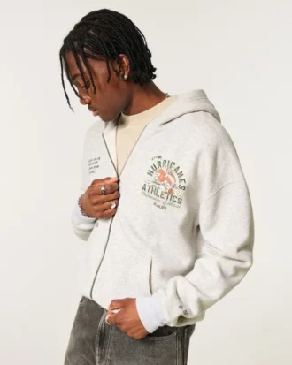Kastenförmiger Hoodie mit Reißverschluss und Grafik der University of Miami Hurricanes Kastenförmiger Hoodie mit Reißverschluss und Grafik der University of Miami Hurricanes