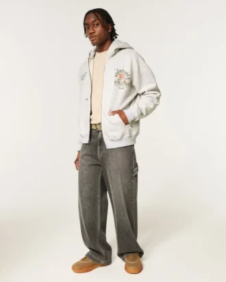 Kastenförmiger Hoodie mit Reißverschluss und Grafik der University of Miami Hurricanes Kastenförmiger Hoodie mit Reißverschluss und Grafik der University of Miami Hurricanes