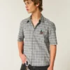Kastig geschnittenes Kurzarm-Shirt mit Kirschgrafik Kastig geschnittenes Kurzarm-Shirt mit Kirschgrafik