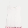Knopf-Minikleid
