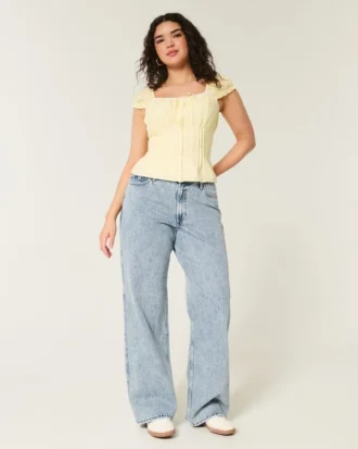 Kurvige High-Rise-Baggy-Jeans in mittlerer Waschung Kurvige High-Rise-Baggy-Jeans in mittlerer Waschung