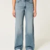 Kurvige High-Rise-Baggy-Jeans in mittlerer Waschung Kurvige High-Rise-Baggy-Jeans in mittlerer Waschung