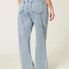 Kurvige High-Rise-Baggy-Jeans in mittlerer Waschung Kurvige High-Rise-Baggy-Jeans in mittlerer Waschung