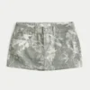 Kurviger Minirock aus Camouflage-Denim mit niedriger Leibhöhe Kurviger Minirock aus Camouflage-Denim mit niedriger Leibhöhe