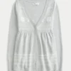 Langärmelige Flyaway Babydoll-Strickjacke Langärmelige Flyaway Babydoll-Strickjacke