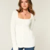 Langärmeliger Babydoll-Pullover mit quadratischem Ausschnitt Langärmeliger Babydoll-Pullover mit quadratischem Ausschnitt