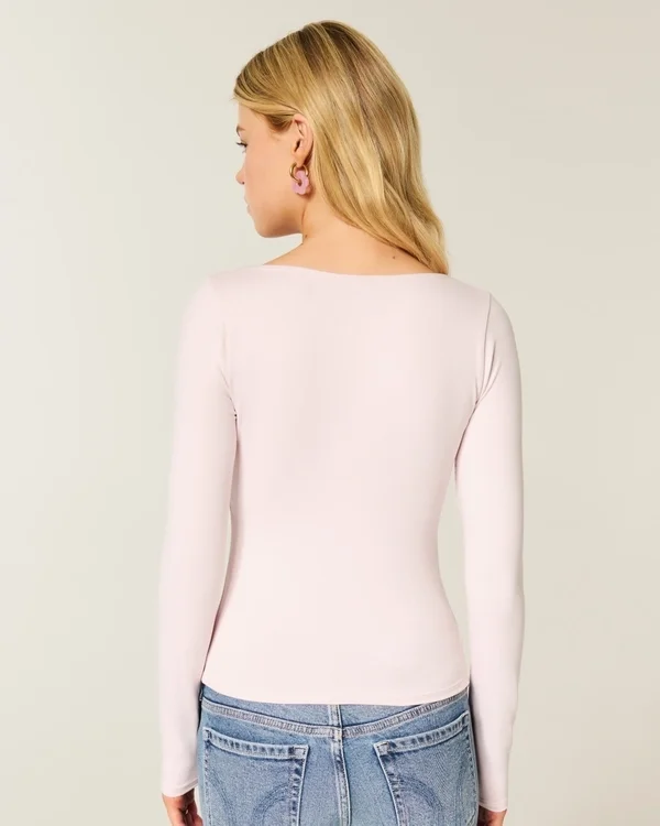 Langärmliges Baby-T-Shirt aus nahtlosem Stoff mit quadratischem Ausschnitt Langärmliges Baby-T-Shirt aus nahtlosem Stoff mit quadratischem Ausschnitt