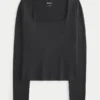 Langärmliges Baby-T-Shirt aus nahtlosem Stoff mit quadratischem Ausschnitt Langärmliges Baby-T-Shirt aus nahtlosem Stoff mit quadratischem Ausschnitt