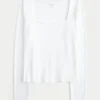 Langärmliges Baby-T-Shirt aus nahtlosem Stoff mit quadratischem Ausschnitt Langärmliges Baby-T-Shirt aus nahtlosem Stoff mit quadratischem Ausschnitt