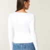Langärmliges Baby-T-Shirt aus nahtlosem Stoff mit Rundhalsausschnitt Langärmliges Baby-T-Shirt aus nahtlosem Stoff mit Rundhalsausschnitt