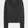 Langärmliges Baby-T-Shirt aus nahtlosem Stoff mit Rundhalsausschnitt Langärmliges Baby-T-Shirt aus nahtlosem Stoff mit Rundhalsausschnitt