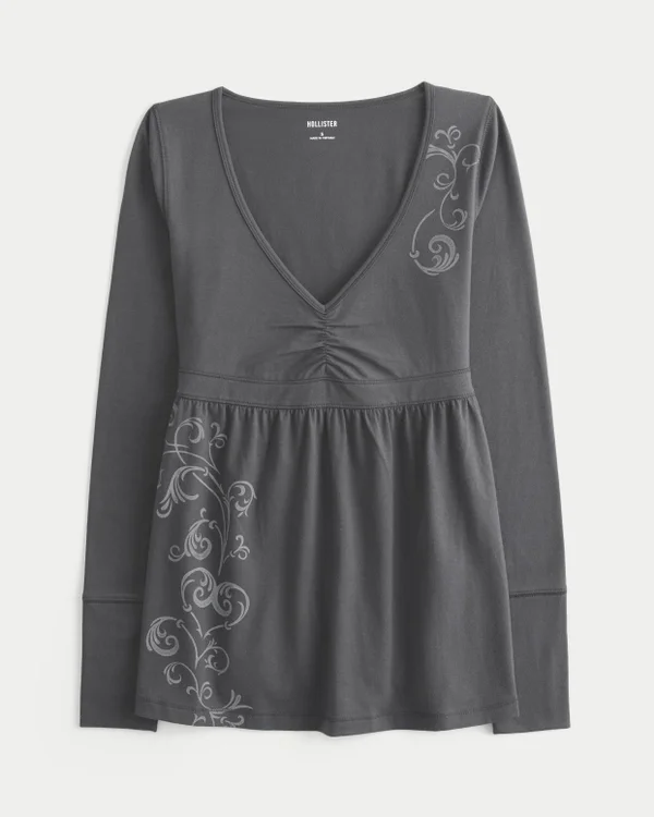 Langärmliges Babydoll-Oberteil mit Grafikprint und gerafftem Brustbereich Langärmliges Babydoll-Oberteil mit Grafikprint und gerafftem Brustbereich