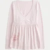 Langärmliges Babydoll-Oberteil mit Grafikprint und gerafftem Brustbereich Langärmliges Babydoll-Oberteil mit Grafikprint und gerafftem Brustbereich