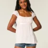 Leichtes Babydoll-Oberteil aus Satin mit Bindeband Leichtes Babydoll-Oberteil aus Satin mit Bindeband