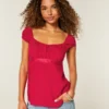Leichtes Babydoll-Oberteil aus Satin mit Bindeband Leichtes Babydoll-Oberteil aus Satin mit Bindeband