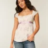 Leichtes Babydoll-Oberteil aus Satin mit Bindeband Leichtes Babydoll-Oberteil aus Satin mit Bindeband