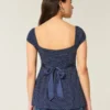 Leichtes Babydoll-Oberteil aus Satin mit Bindeband Leichtes Babydoll-Oberteil aus Satin mit Bindeband