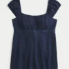 Leichtes Babydoll-Oberteil aus Satin mit Bindeband Leichtes Babydoll-Oberteil aus Satin mit Bindeband