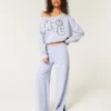 Leichtes Off-Shoulder-Sweatshirt mit NYC-Grafik Leichtes Off-Shoulder-Sweatshirt mit NYC-Grafik