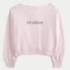 Leichtes Sweatshirt mit Schulterausschnitt und Los Angeles-Aufdruck Leichtes Sweatshirt mit Schulterausschnitt und Los Angeles-Aufdruck