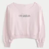 Leichtes Sweatshirt mit Schulterausschnitt und Los Angeles-Aufdruck Leichtes Sweatshirt mit Schulterausschnitt und Los Angeles-Aufdruck