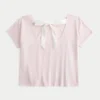 Leichtes T-Shirt mit Blumenmuster und Bindeband Leichtes T-Shirt mit Blumenmuster und Bindeband
