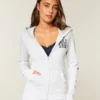 Logo-Grafik-Kapuzenjacke mit Reißverschluss Logo-Grafik-Kapuzenjacke mit Reißverschluss