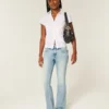 Low-Rise-Jeans mit mittlerer Waschung und gesticktem Schmetterling, Bootcut Low-Rise-Jeans mit mittlerer Waschung und gesticktem Schmetterling, Bootcut