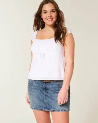 Low-Rise-Minirock aus besticktem Denim