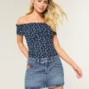 Mini-Skort aus Denim mit niedriger Leibhöhe, mittlerer Waschung und Flaggenstickerei Mini-Skort aus Denim mit niedriger Leibhöhe, mittlerer Waschung und Flaggenstickerei