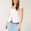 Mini-Skort aus Denim mit niedriger Leibhöhe und Eisenbahnstreifen Mini-Skort aus Denim mit niedriger Leibhöhe und Eisenbahnstreifen