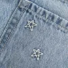 Mini-Skort aus Denim mit niedriger Leibhöhe und Sternstickerei Mini-Skort aus Denim mit niedriger Leibhöhe und Sternstickerei