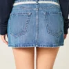 Mini-Skort aus Denim mit Spitzenbindung Mini-Skort aus Denim mit Spitzenbindung
