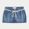 Mini-Skort aus Denim mit Spitzenbindung Mini-Skort aus Denim mit Spitzenbindung