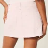 Mini-Skort aus rosa Denim mit niedriger Leibhöhe
