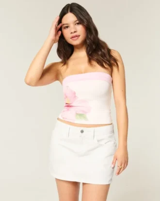Mini-Skort aus weißem Denim mit niedriger Leibhöhe Mini-Skort aus weißem Denim mit niedriger Leibhöhe