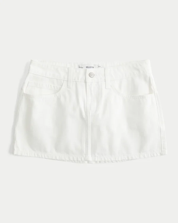 Mini-Skort aus weißem Denim mit niedriger Leibhöhe Mini-Skort aus weißem Denim mit niedriger Leibhöhe