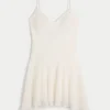 Minikleid mit asymmetrischem Saum und Spitze Minikleid mit asymmetrischem Saum und Spitze