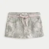 Minirock mit niedriger Taille, rosa Schnürung und Camouflage-Muster Minirock mit niedriger Taille, rosa Schnürung und Camouflage-Muster
