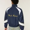 Mit Fleece gefütterte Real Madrid CF Grafik-Trainingsjacke Mit Fleece gefütterte Real Madrid CF Grafik-Trainingsjacke